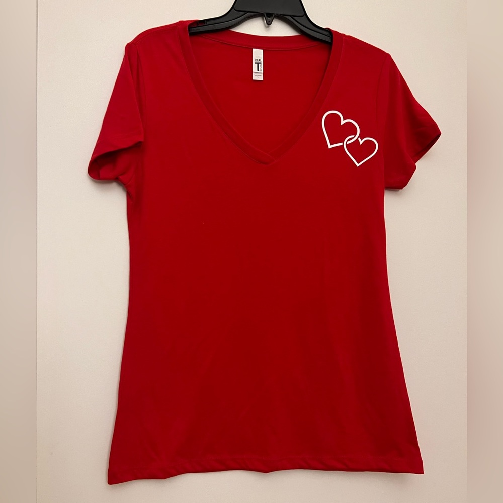 Brand new Women’s Custommade Red T-shirt with White Hearts. Size: Large (L)